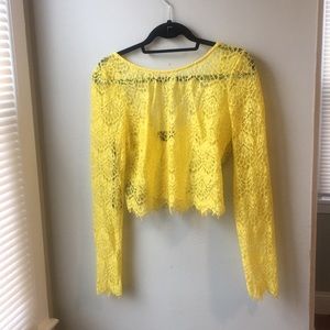 Yellow Bebe sheet lace crop top size large